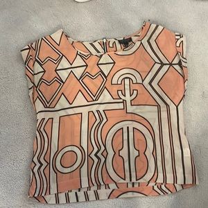 Peach and cream printed blouse.